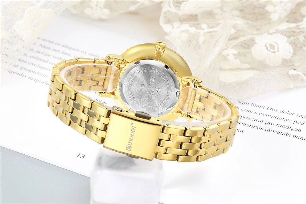 Reloj curren dama